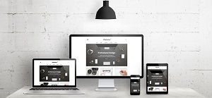 Creative deks scene for web design agency promotion. Modern, clean responsive web site promotion on different devices. Designer studio desk front view.